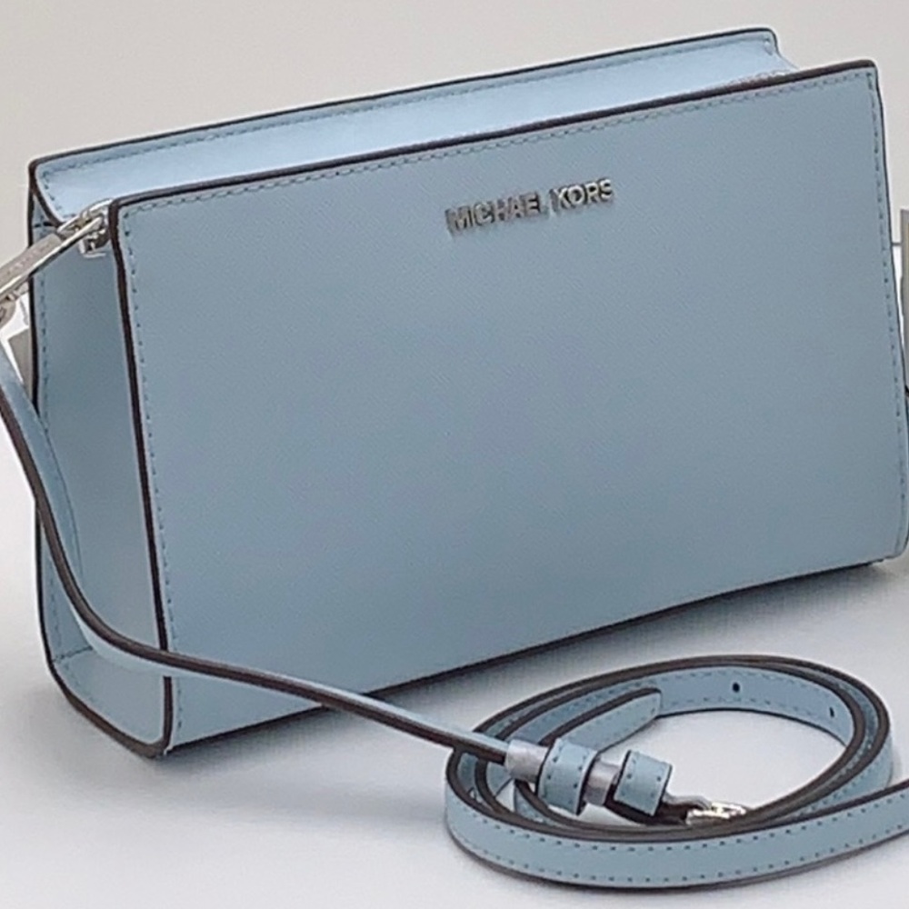 MICHAEL KORS
Sheila Small Faux Leather Crossbody Bag
Vista Blue 
NWT gorgeous !!